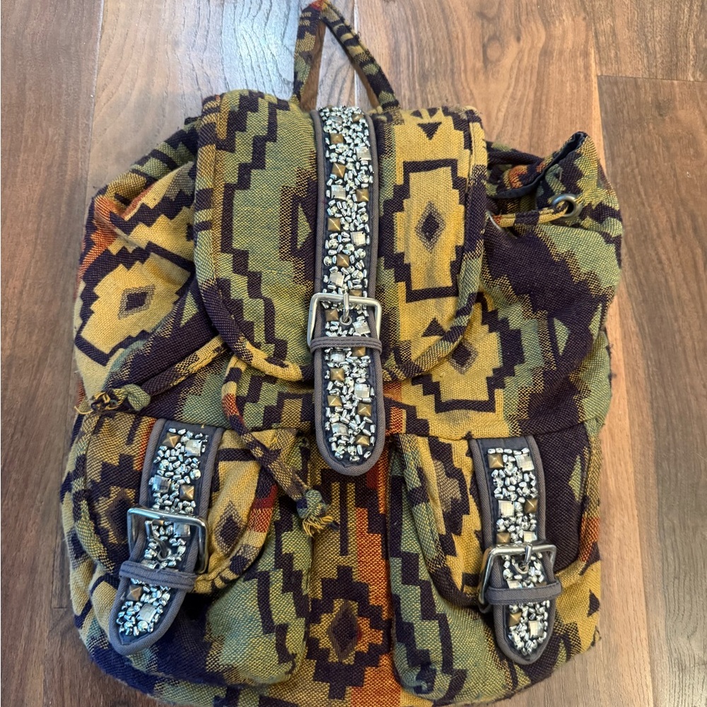 Urban Outfitters Patterned Backpack with Buckle Accents